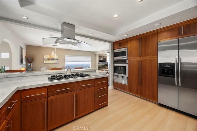 12281 Alta Panorama, North Tustin, CA 92705 - kitchen with stainless steel appliances, a warming drawer, light wood-style floors, recessed lighting, and island range hood