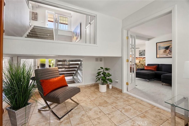 12281 Alta Panorama, North Tustin, CA 92705 - sitting room featuring stairway, plenty of natural light, and tile patterned flooring