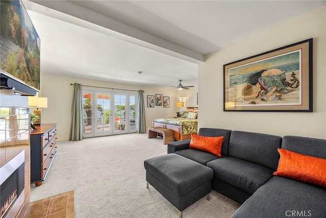 12281 Alta Panorama, North Tustin, CA 92705 - living room featuring light colored carpet, a fireplace with flush hearth, and a ceiling fan