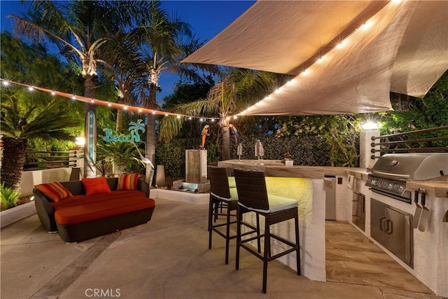 12281 Alta Panorama, North Tustin, CA 92705 - patio at twilight with an outdoor kitchen and a patio
