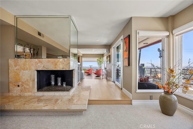 12281 Alta Panorama, North Tustin, CA 92705 - carpeted living room with a fireplace and healthy amount of natural light