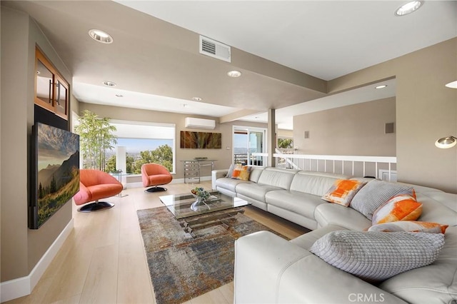 12281 Alta Panorama, North Tustin, CA 92705 - living area featuring a wall mounted AC, wood finished floors, and recessed lighting
