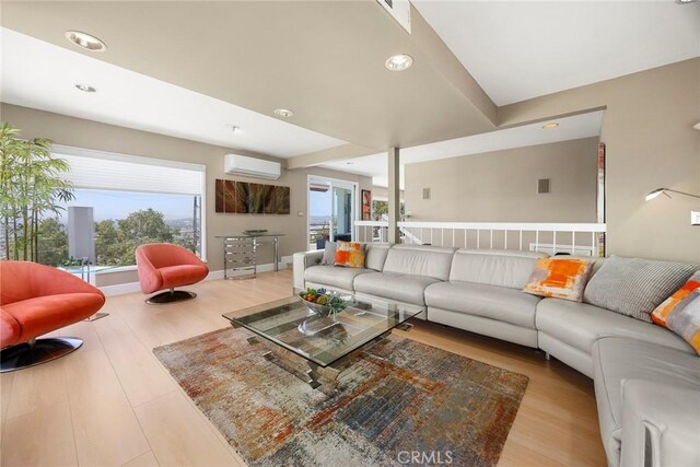 12281 Alta Panorama, North Tustin, CA 92705 - living area with a wall mounted air conditioner, wood finished floors, and recessed lighting