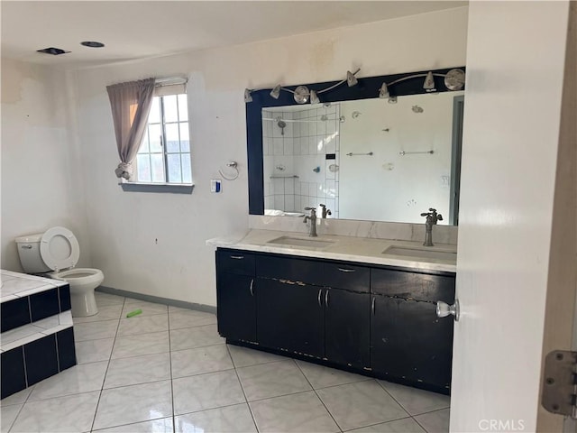 20635 Tonawanda Rd, Apple Valley, CA 92307 - bathroom with double vanity, tiled shower, and tile patterned floors