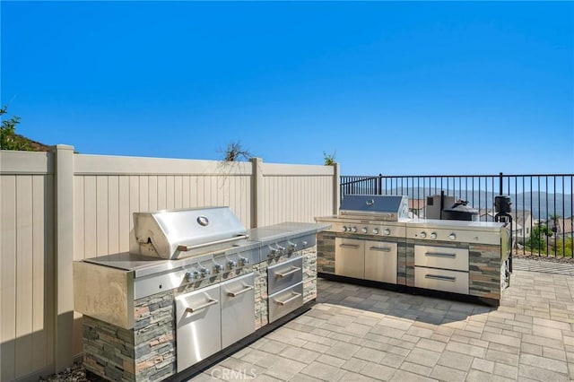 28511 Sparrow Way, Saugus, CA 91350 - view of patio / terrace with exterior kitchen