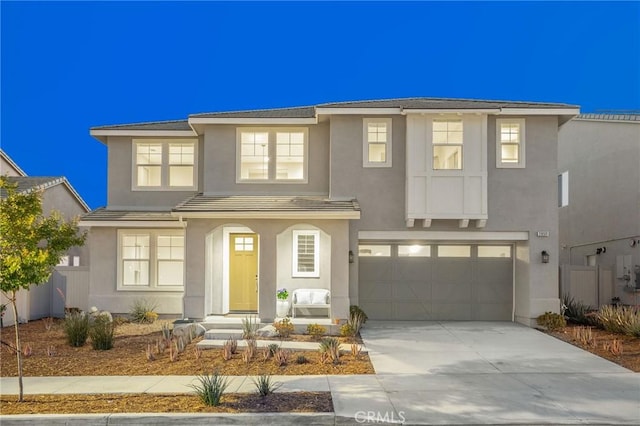 28511 Sparrow Way, Saugus, CA 91350 - traditional-style house with driveway, stucco siding, an attached garage, and a tile roof