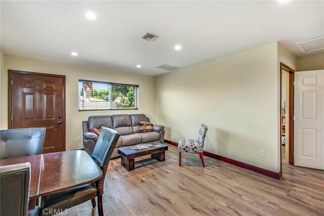 2685 Arrow Hwy, La Verne, CA 91750 - living area featuring wood finished floors and recessed lighting