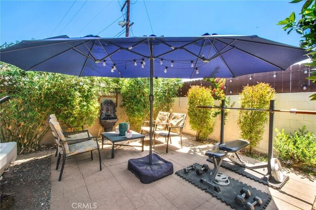 2685 Arrow Hwy, La Verne, CA 91750 - fenced backyard featuring a patio area