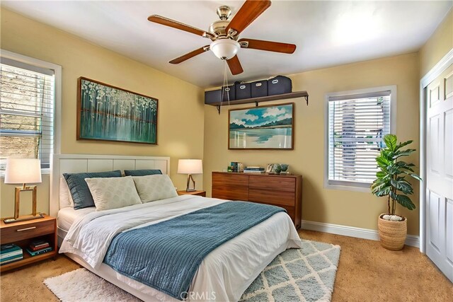 2685 Arrow Hwy, La Verne, CA 91750 - carpeted bedroom with a ceiling fan and baseboards