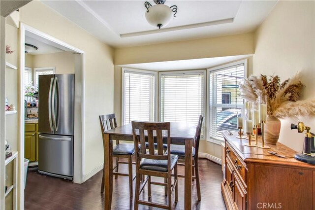 2685 Arrow Hwy, La Verne, CA 91750 - dining room with dark wood-type flooring and baseboards