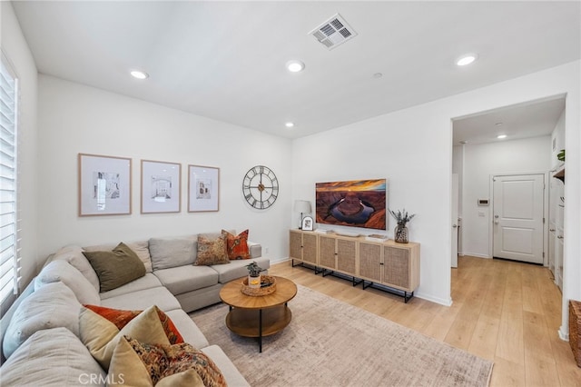 1060 Kendale Way, Vista, CA 92081 - living room featuring light wood-type flooring, recessed lighting, and healthy amount of natural light