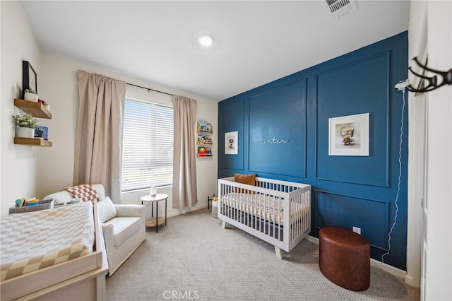 1060 Kendale Way, Vista, CA 92081 - bedroom with a nursery area, light colored carpet, and a decorative wall