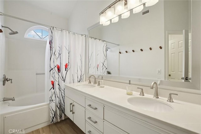 306 San Nicholas Ct, Laguna Beach, CA 92651 - full bathroom with shower / tub combo with curtain, double vanity, and wood finished floors