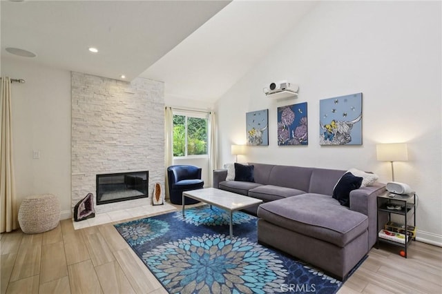 306 San Nicholas Ct, Laguna Beach, CA 92651 - living area featuring wood finished floors, a fireplace, and vaulted ceiling