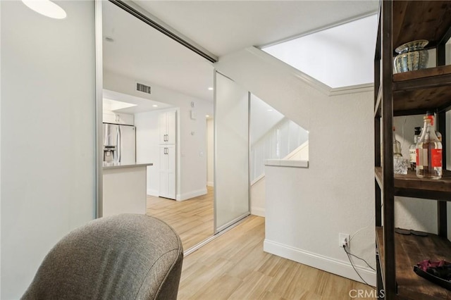 306 San Nicholas Ct, Laguna Beach, CA 92651 - hallway with light wood finished floors and baseboards