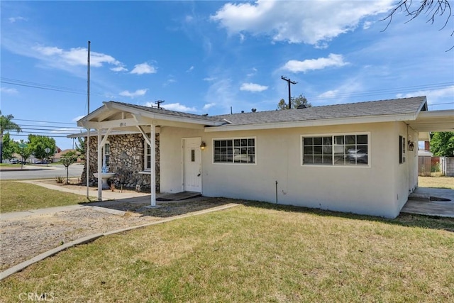 6910 Carnelian St, Rancho Cucamonga, CA 91701 - ranch-style home with stucco siding and a front yard