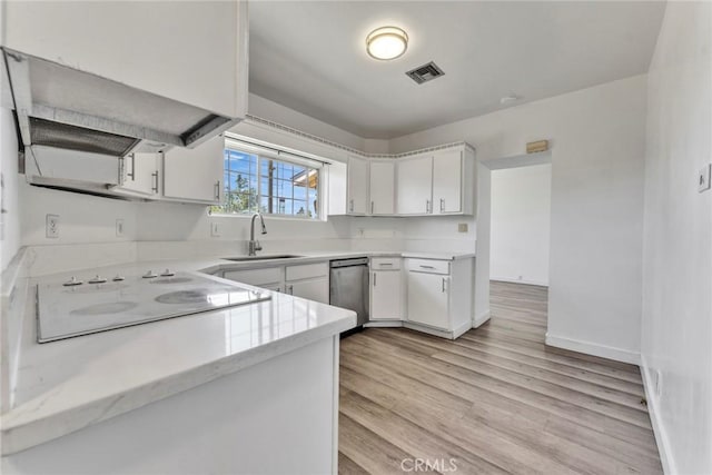 6910 Carnelian St, Rancho Cucamonga, CA 91701 - kitchen with stainless steel dishwasher, light countertops, ventilation hood, white electric cooktop, and light wood-style flooring