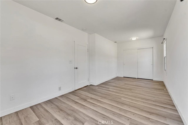 6910 Carnelian St, Rancho Cucamonga, CA 91701 - unfurnished bedroom featuring light wood-type flooring and a closet