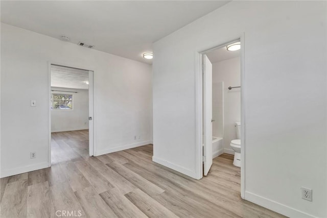 6910 Carnelian St, Rancho Cucamonga, CA 91701 - spare room featuring light wood-style floors and a smoke detector