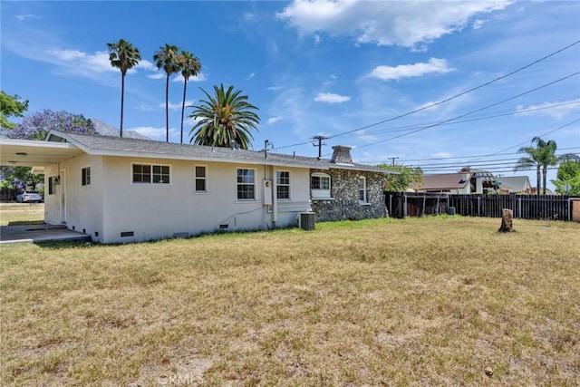 6910 Carnelian St, Rancho Cucamonga, CA 91701 - rear view of house featuring crawl space and a carport