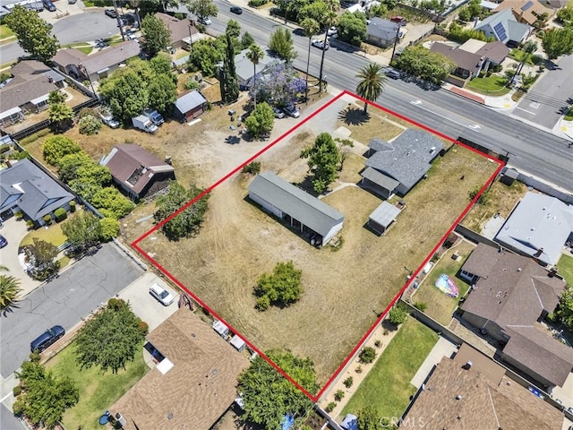 6910 Carnelian St, Rancho Cucamonga, CA 91701 - aerial perspective of suburban area with property boundaries highlighted