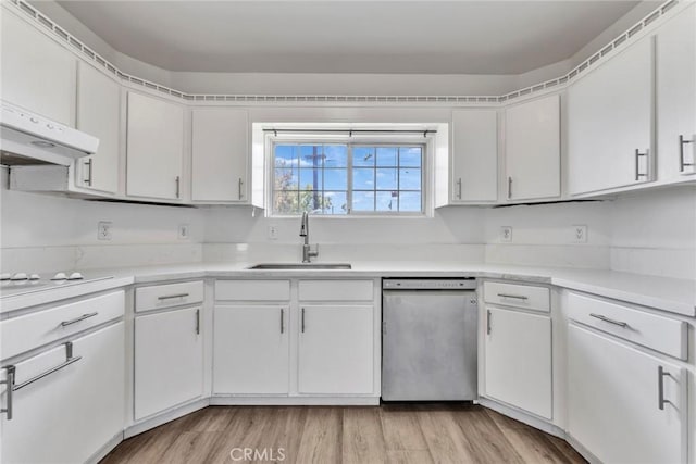 6910 Carnelian St, Rancho Cucamonga, CA 91701 - kitchen with dishwasher, white cooktop, light wood-style flooring, light countertops, and white cabinetry