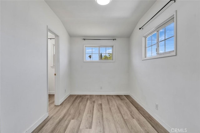 6910 Carnelian St, Rancho Cucamonga, CA 91701 - unfurnished bedroom featuring multiple windows and light wood-style floors