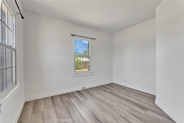 6910 Carnelian St, Rancho Cucamonga, CA 91701 - empty room with wood finished floors and baseboards
