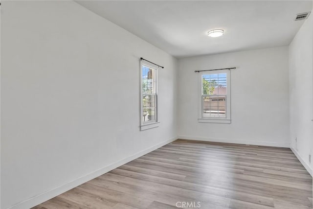 6910 Carnelian St, Rancho Cucamonga, CA 91701 - unfurnished room featuring light wood-style floors and baseboards