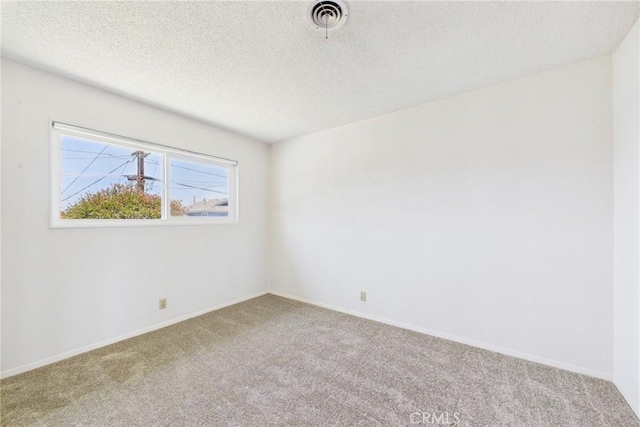 10469 Gregory Cir, Cypress, CA 90630 - carpeted empty room with a textured ceiling and baseboards