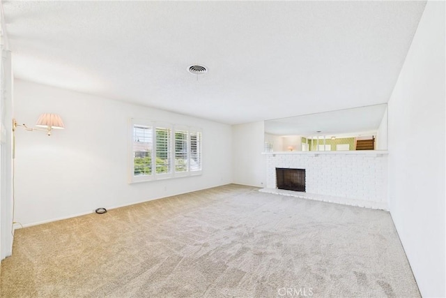 10469 Gregory Cir, Cypress, CA 90630 - unfurnished living room featuring carpet floors and a fireplace