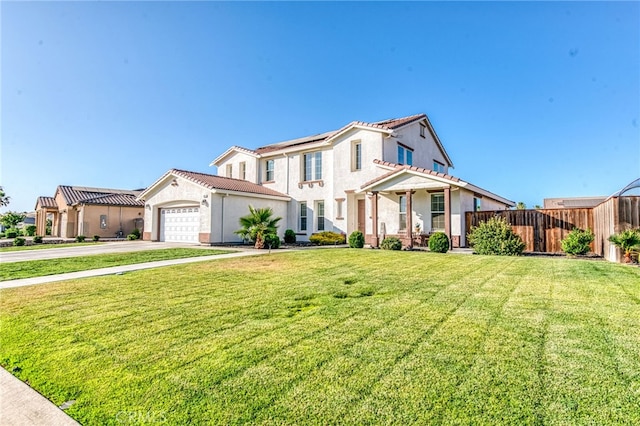 14655 Spanish Bay Way, Chowchilla, CA 93610 - view of front of property featuring driveway, stucco siding, a garage, and a tiled roof