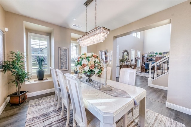 14655 Spanish Bay Way, Chowchilla, CA 93610 - dining space featuring wood finished floors, stairway, and recessed lighting