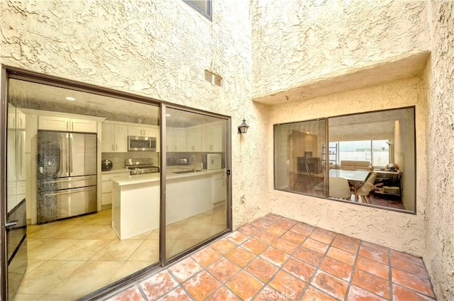 9724 Walker Ct Unit 18, Cypress, CA 90630 - view of patio featuring a sink and an outdoor kitchen