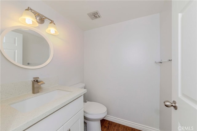 9724 Walker Ct Unit 18, Cypress, CA 90630 - half bathroom with vanity and wood finished floors