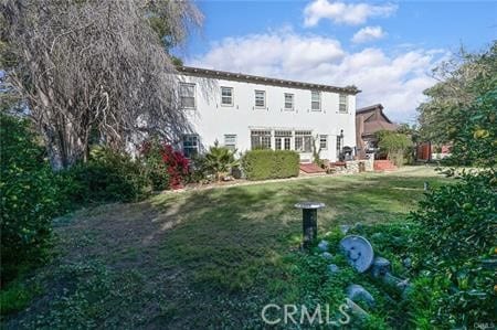 200 E 13th St, Upland, CA 91786 - back of house featuring a lawn