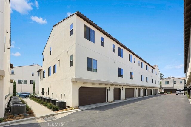 24 Bedford Ct, Arcadia, CA 91007 - view of building exterior featuring a garage