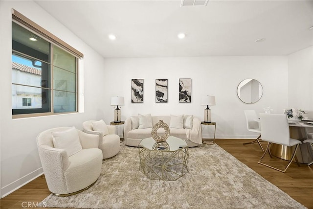 24 Bedford Ct, Arcadia, CA 91007 - living area featuring wood finished floors and recessed lighting