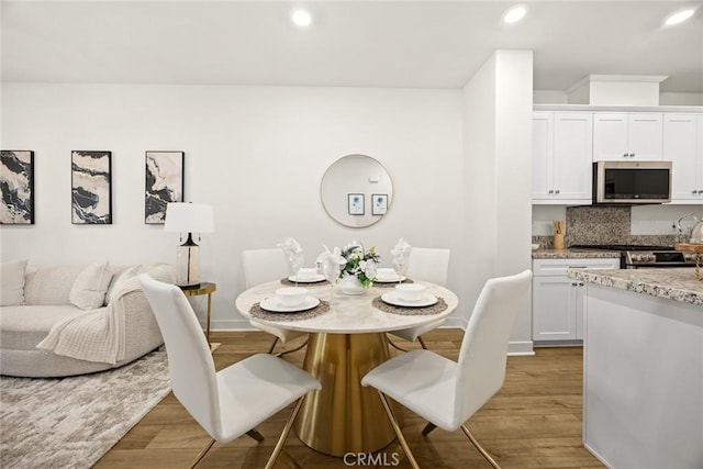 24 Bedford Ct, Arcadia, CA 91007 - dining area featuring light wood-style floors and recessed lighting