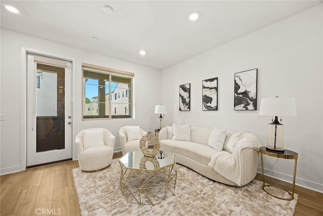 24 Bedford Ct, Arcadia, CA 91007 - living area featuring wood finished floors and recessed lighting