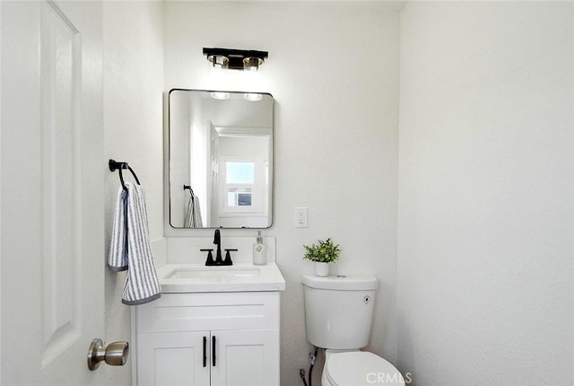 1113 W 78th St, Los Angeles, CA 90044 - bathroom featuring vanity and toilet