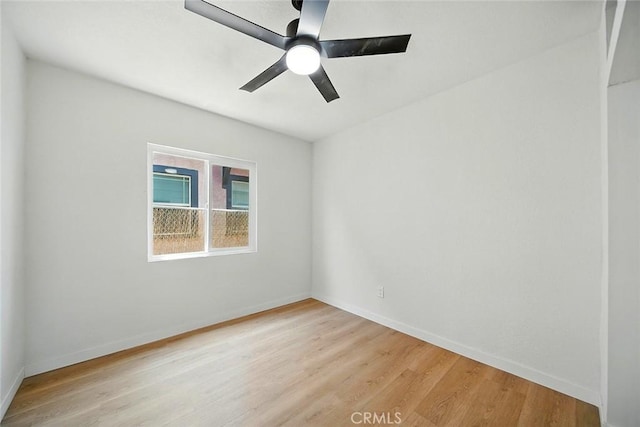 1113 W 78th St, Los Angeles, CA 90044 - spare room featuring light wood-style flooring and ceiling fan