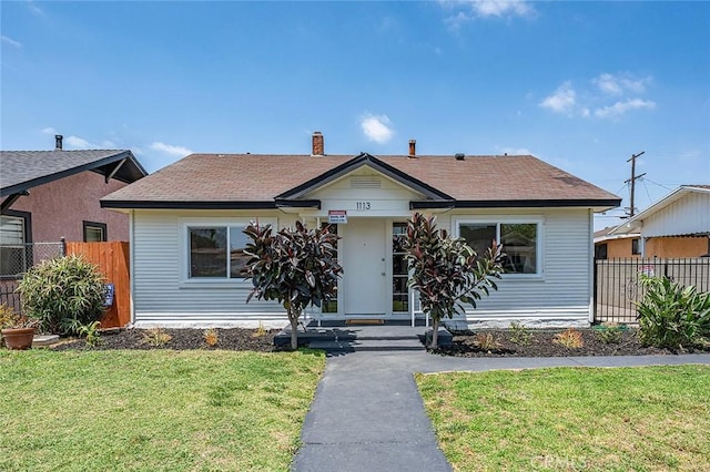 1113 W 78th St, Los Angeles, CA 90044 - bungalow with roof with shingles and a chimney