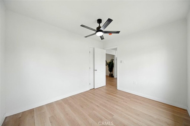 1113 W 78th St, Los Angeles, CA 90044 - empty room featuring light wood-style floors and a ceiling fan