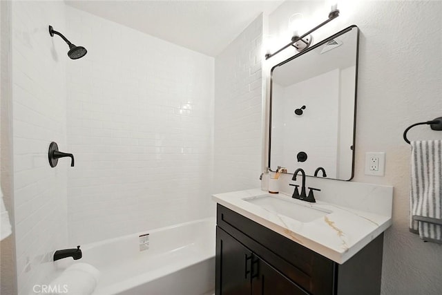 1113 W 78th St, Los Angeles, CA 90044 - bathroom with vanity, shower / washtub combination, and a textured wall