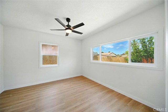 1113 W 78th St, Los Angeles, CA 90044 - unfurnished room with light wood-type flooring and ceiling fan