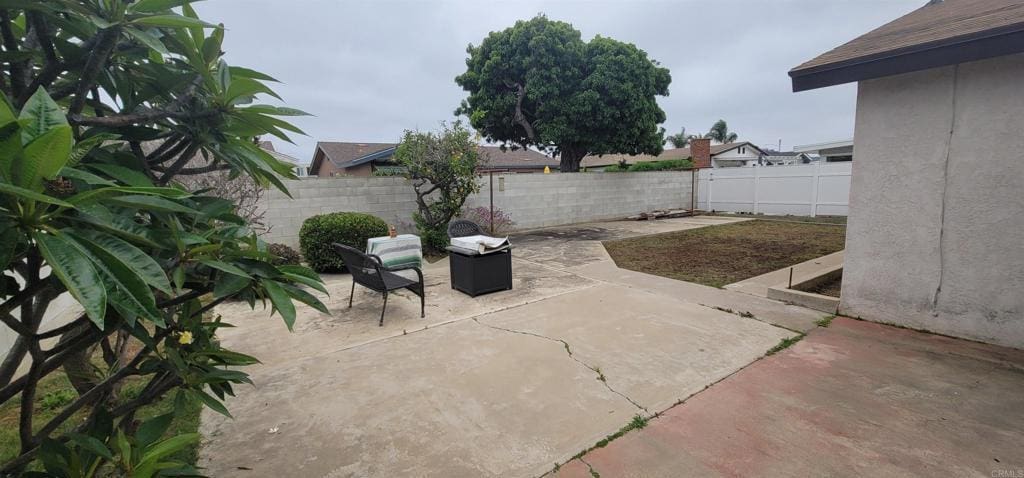 1477 Signal Ave, San Diego, CA 92154 - fenced backyard featuring a patio