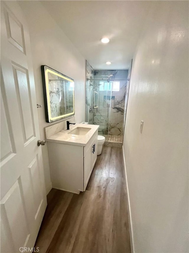 125 Campanita Ct, Monterey Park, CA 91754 - full bath with wood finished floors, vanity, a marble finish shower, and recessed lighting