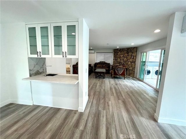 125 Campanita Ct, Monterey Park, CA 91754 - hallway featuring wood finished floors, independent washer and dryer, and recessed lighting