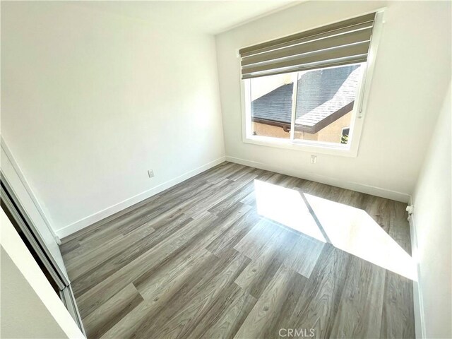 125 Campanita Ct, Monterey Park, CA 91754 - empty room featuring baseboards and wood finished floors